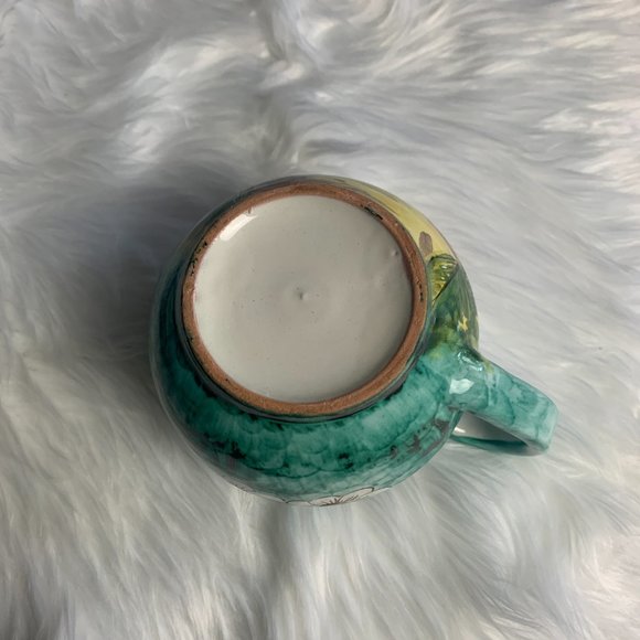 Hand Crafted Pottery Pitcher Green Yellow Floral Design and Structured Building - Picture 7 of 7